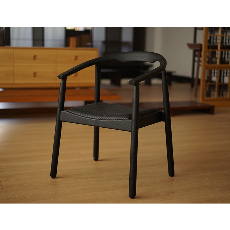 How can the tilt angle adjustment of a modern armchair be scientifically designed?